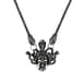 An antique silver-colored necklace with the symbol "Medusa".
