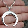 hunting moon crescent necklace hand