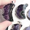 crescent-moon-raw-amethyst-necklace-hellaholics-size-hand