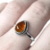 elara-silver-amber-ring-close-up-hellaholics (1)