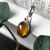 yrsa-amber-silver-necklace-close-up-hellaholics