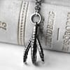 claw-silver-necklace-close-up-hellaholics