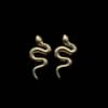 serpentine-fire-stainless-steel-gold-snake-stud-earrings-hellaholics-black-background