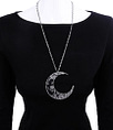 restyle-moon-crescent-silver-necklace-on-doll-dark-clothing