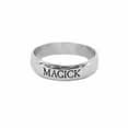 solid 925 sterling silver ring with the engraved text "magick"