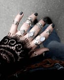 SIlver moonstone rings styled with black lace and denim flares