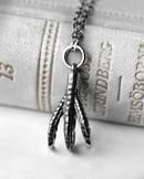 claw-silver-necklace-close-up-hellaholics