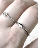 silver-ouroboros-ring-snake-finger-closeup-hellaholics