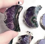 crescent-moon-raw-amethyst-necklace-hellaholics-size-hand