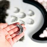 titanium-druzy-crescent-moon-necklace-hellaholics-hand-size
