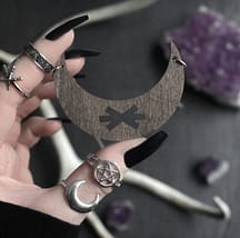 hagal-rune-crescent-brown-hellaholics-hand