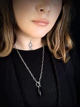 orla-stainless-steel-obsidian-necklace-hellaholics-on-model-againt-black