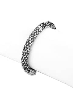 Backside of two headed snake bracelet in stainless steel on a display stand for bracelets.