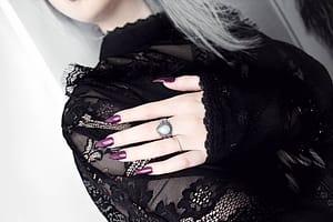 instagram influencer tavujesus wears gothic black lace and hellaholics sterling silver moonstone ring