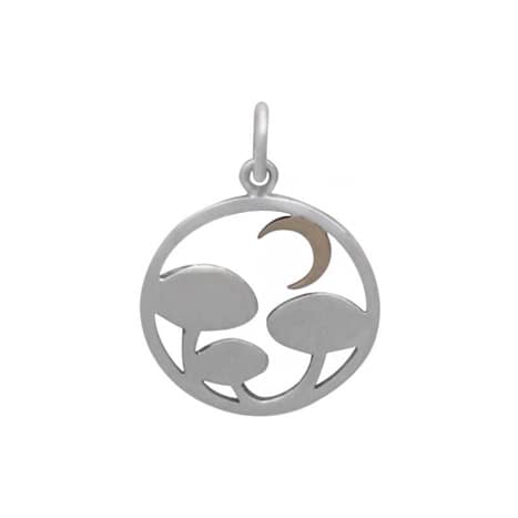 Close-up view of reverse side of recycled sterling silver necklace with intricate details and oxidised finish, the neckless is 3 mushrooms under a crescent moon, all enframed in a circle, all-white background