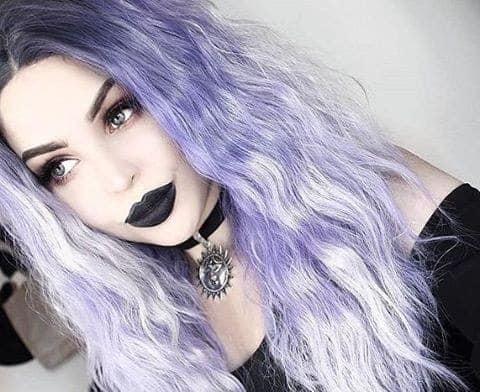 alternative model tavujeus wears a purple wig with black lipstick and hellaholics 90s velvet sun choker