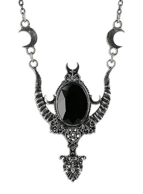 Gothic necklace with a black stone, pentagram symbol, crescent moons and floral ornaments.