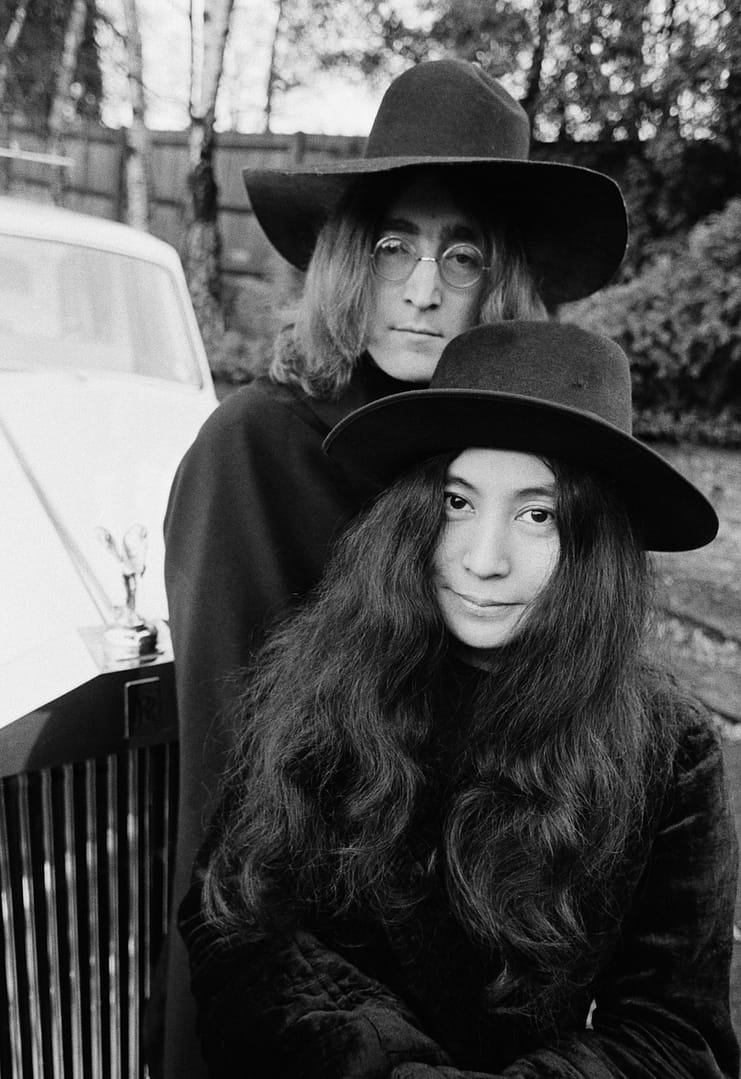 Yoko Ono and John Lennon at their home in England, December 1968.