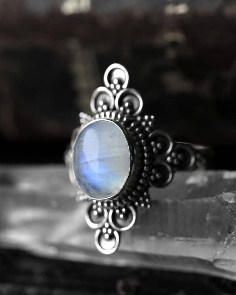 ariana silver moonstone ring close-up on crystal background