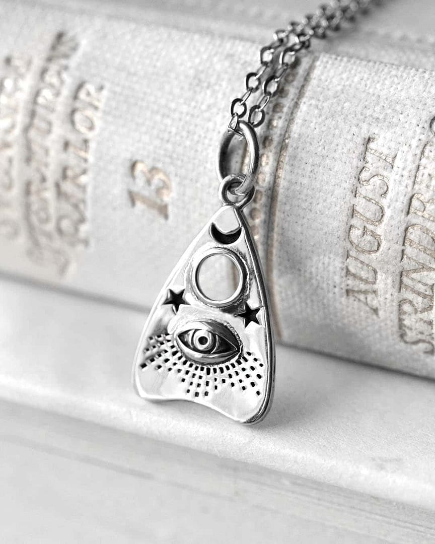 Ouija necklace in sterling silver on white background