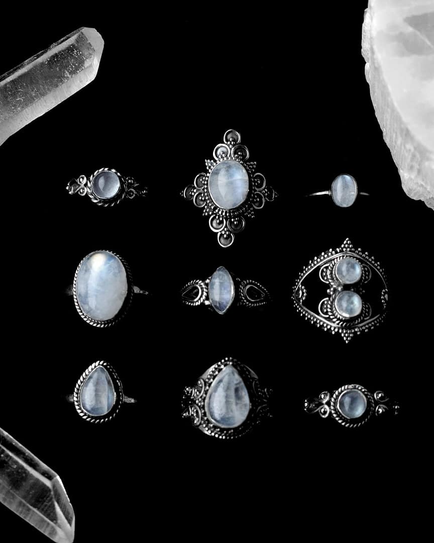 amaya-ariana silver-moonstone-ring-theia-gaia-nea-nalani-elara-nakti-moonstone-silver-rings-mix-hellaholics severa sterling silver moonstone rings on black background