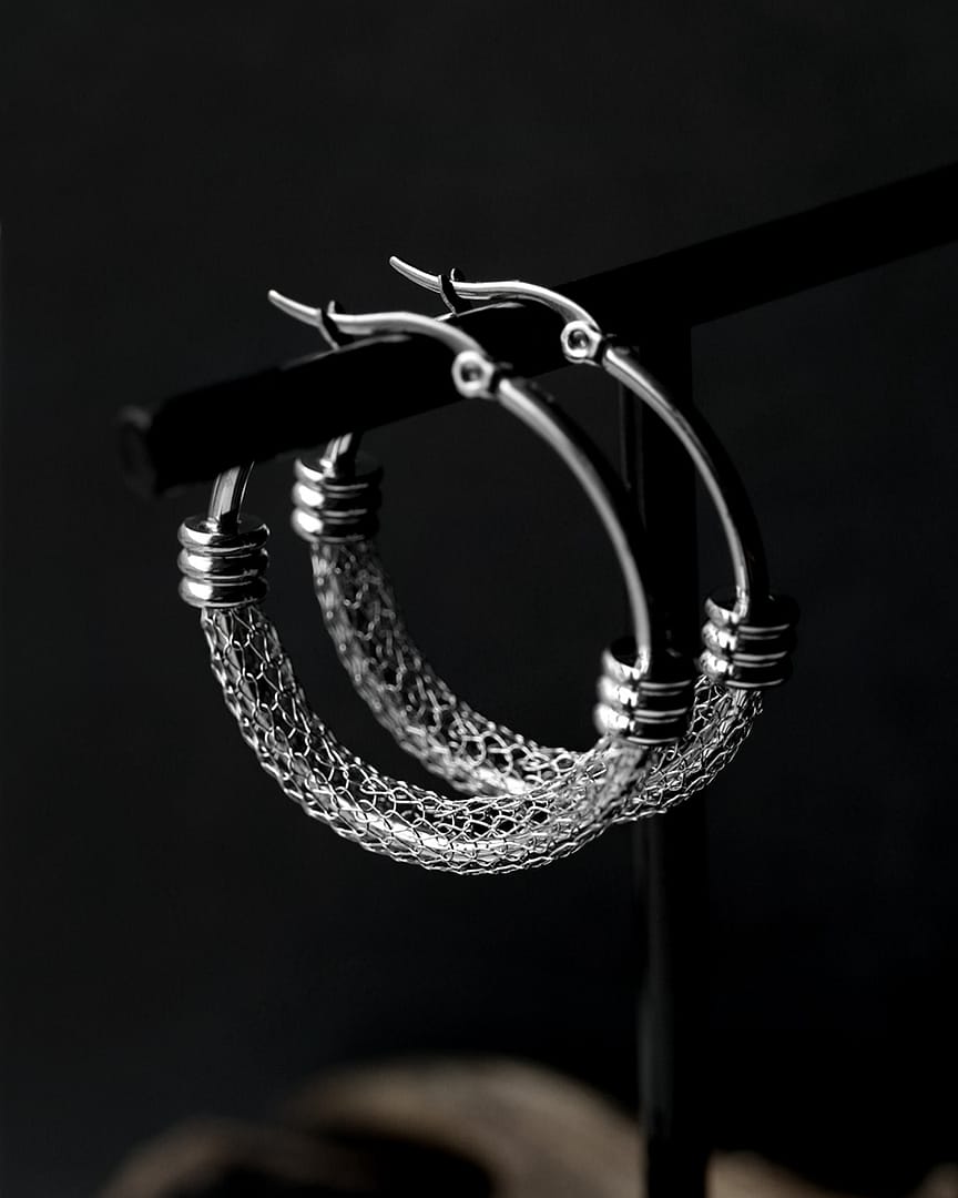 chains-of-misery-stainless-steel-earrings-hellaholics Mesh hoops stainless steel in pair on black hanger