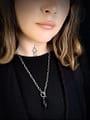 orla-stainless-steel-obsidian-necklace-hellaholics-on-model-againt-black