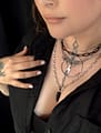 orla-stainless-steel-obsidian-necklace-hellaholics-on-model-close-up